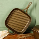 wanda-june-home-bronzed-pre-seasoned-cast-iron-square-11-inch-grill-pan-by-miranda-lambert-02-1d7f7afb-1aa1-45c2-bce6-4df6ef418c66.20c95a78cf0017386e8b73e2b9c32489.jpg