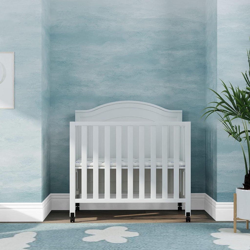 davinci-charlie-folding-portable-3-in-1-convertible-mini-crib-and-twin-bed-in-white-removable-wheels-greenguard-gold-certified-03-288b78eecfa37299d0c1875cf0cae539.jpg