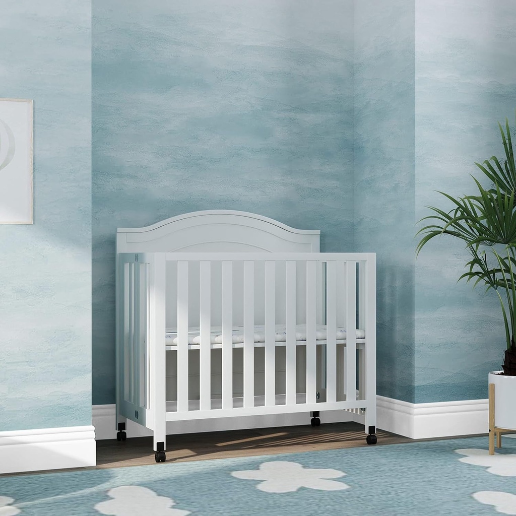 davinci-charlie-folding-portable-3-in-1-convertible-mini-crib-and-twin-bed-in-white-removable-wheels-greenguard-gold-certified-08-f8ac1b8ba07658f92d827ece826dadf4.jpg
