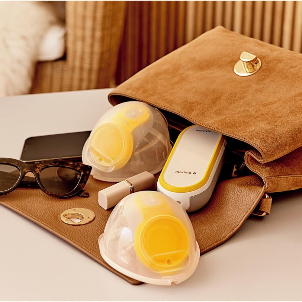 medela-freestyle-hands-free-breast-pump-wearable-portable-and-discreet-double-12-c18768688ceacc7fb2d970c86a551f4f.jpg