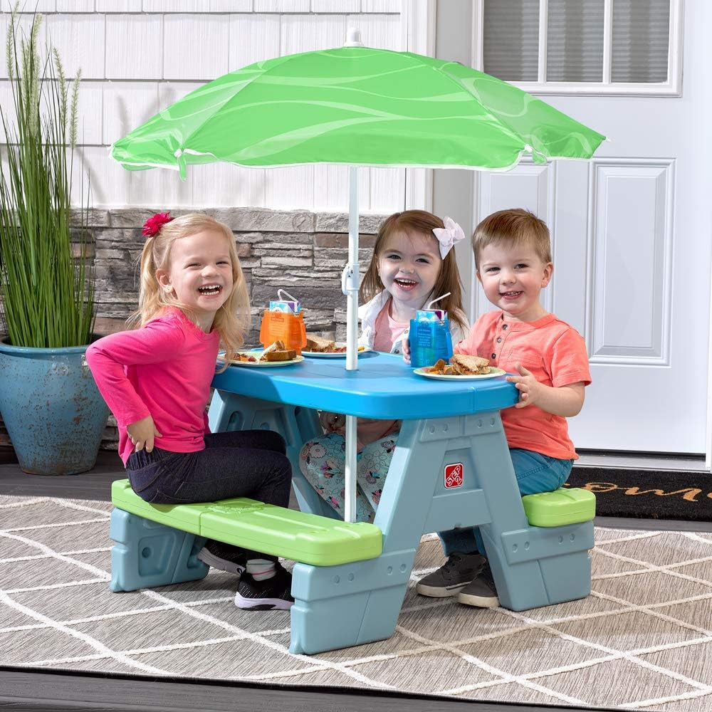 step2-sun-shade-kids-picnic-table-with-umbrella-durable-indoor-outdoor-toys-02-f6dd21118e33535ad043a08c02e17c14.jpg
